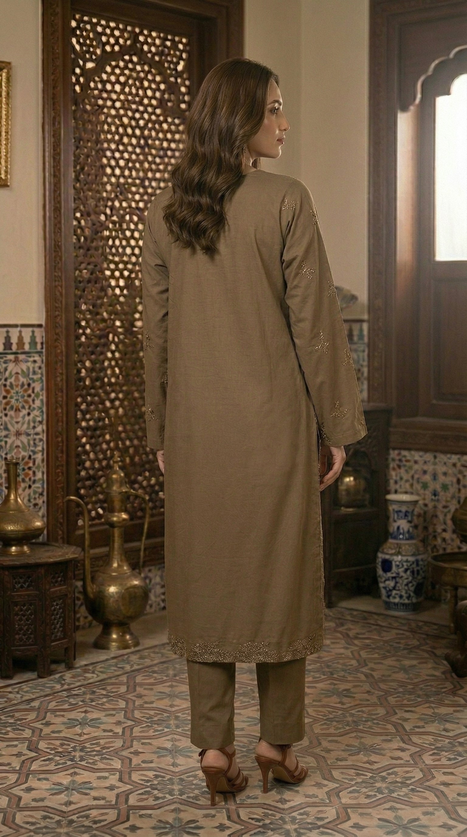 Back view of olive brown long embroidered shirt paired with matching straight trousers for women.