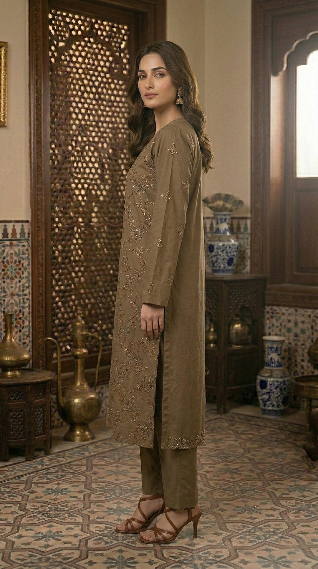 Side profile of elegant olive brown embroidered straight shirt with matching trousers for women.